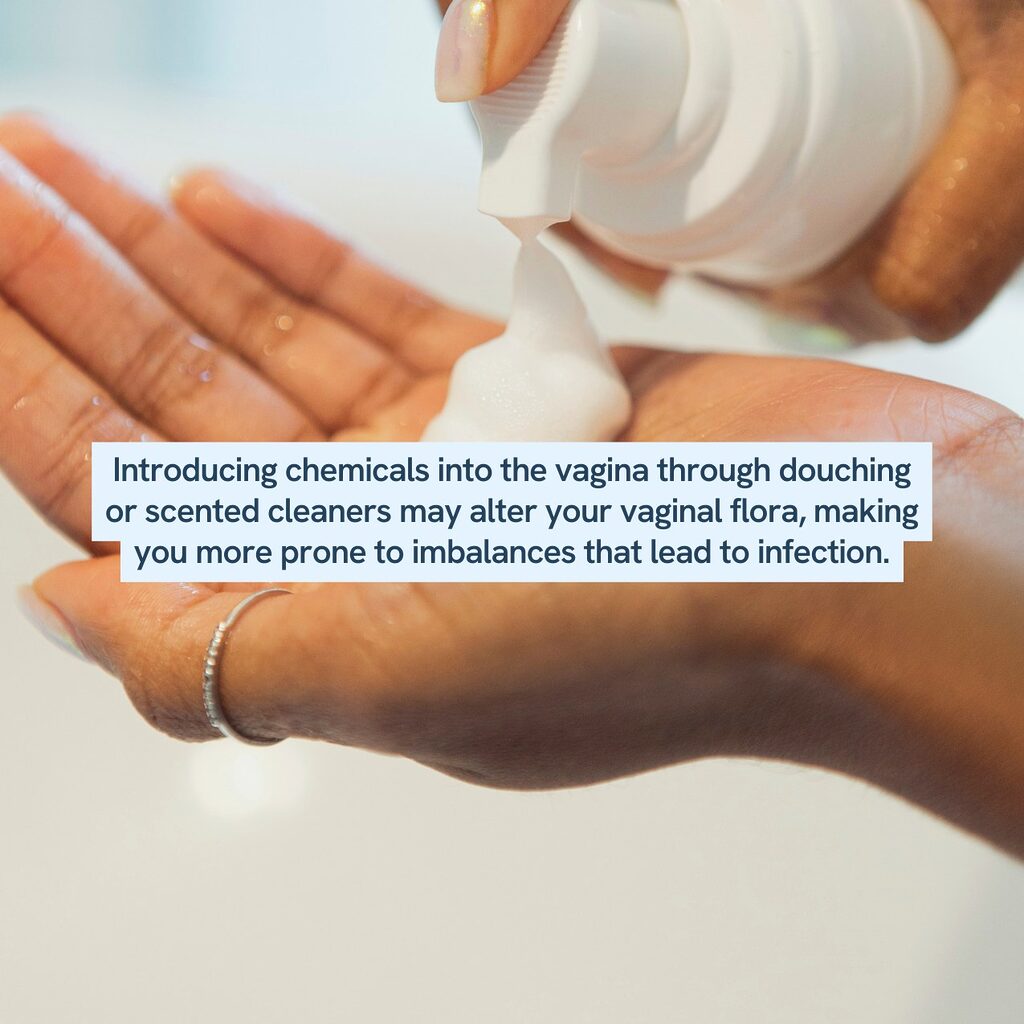 Close-up of hands dispensing foam from a pump bottle with a warning about the risks of douching or using scented vaginal cleaners, noting they can disrupt vaginal flora and increase infection risk