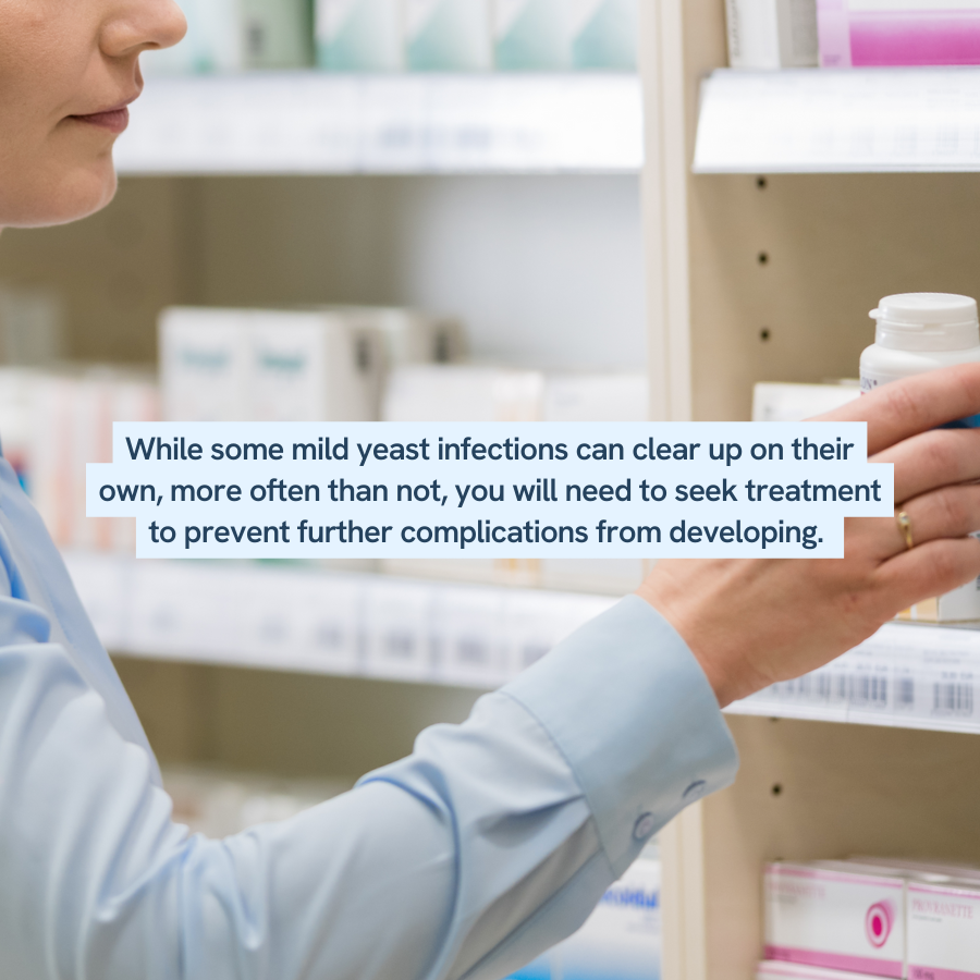 The image shows a person in a pharmacy reaching for a bottle on a shelf filled with various medications. The text overlay in the center of the image reads, “While some mild yeast infections can clear up on their own, more often than not, you will need to seek treatment to prevent further complications from developing.”