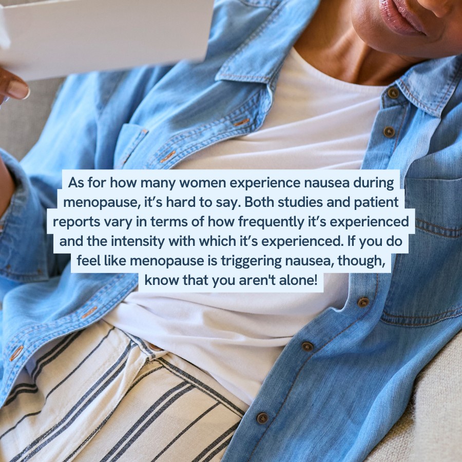 Close-up of a person in a blue denim shirt and striped pants, sitting down and reading a paper. Text overlay reads: ‘As for how many women experience nausea during menopause, it’s hard to say. Both studies and patient reports vary in terms of how frequently it’s experienced and the intensity with which it’s experienced. If you do feel like menopause is triggering nausea, though, know that you aren’t alone!